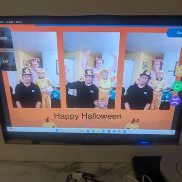 Three Halloween-themed family photos on a screen with "Happy Halloween" text.