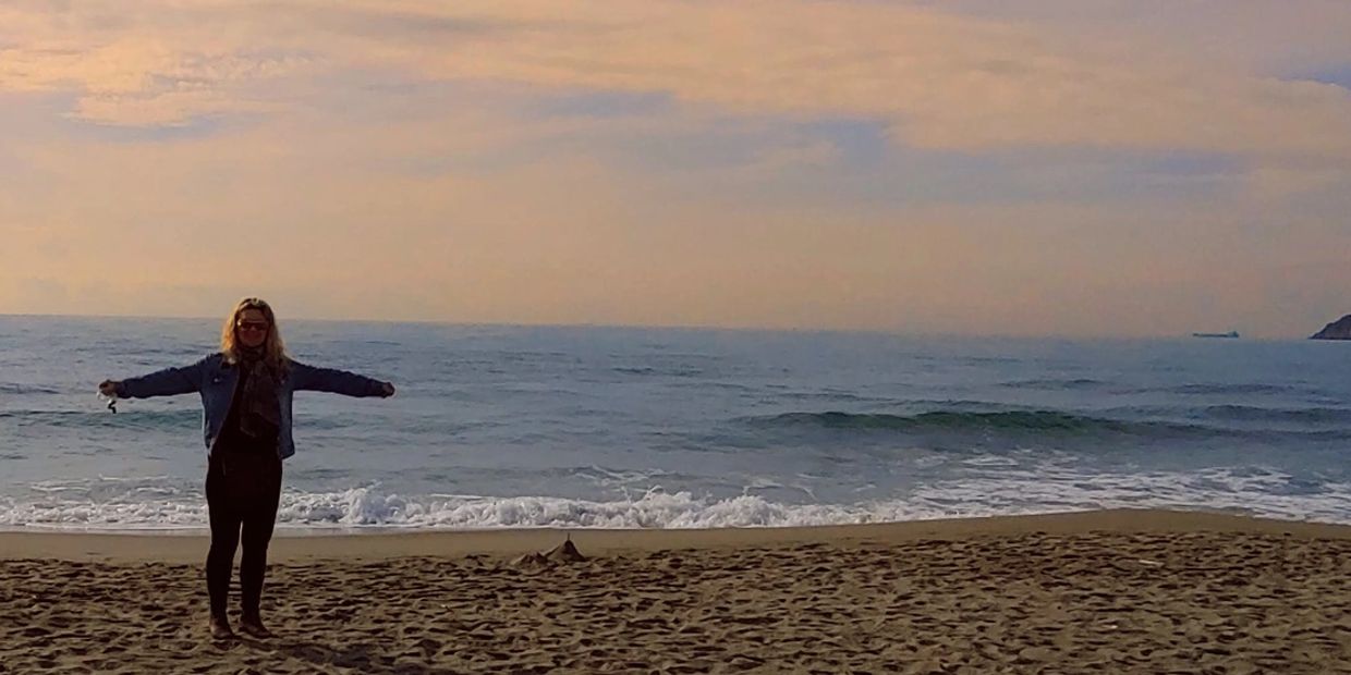 Sharing my mother's ashes on the beach near Marina di Carrara, Apennine Mountains, Italy.