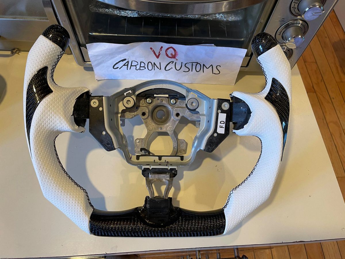 made to order 370z fighter jet style carbon fiber steering wheel