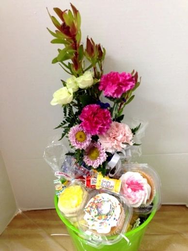 Fresh cookies and flowers gift basket
