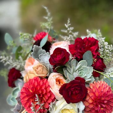 burgundy and peach bridal bouquet with succulents, roses, dahlias, misty, dusty miller, eucalyptus 