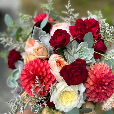 burgundy and peach bridal bouquet with succulents, roses, dahlias, misty, dusty miller, eucalyptus 