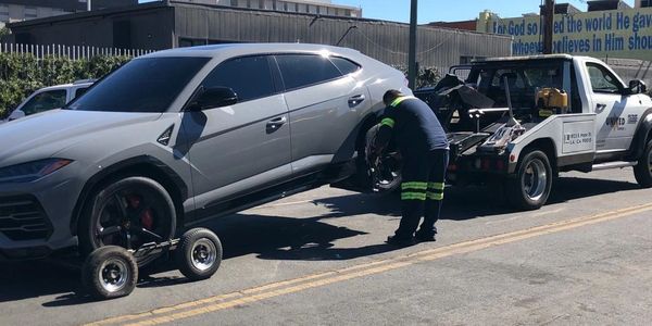 Luxury sports car towing