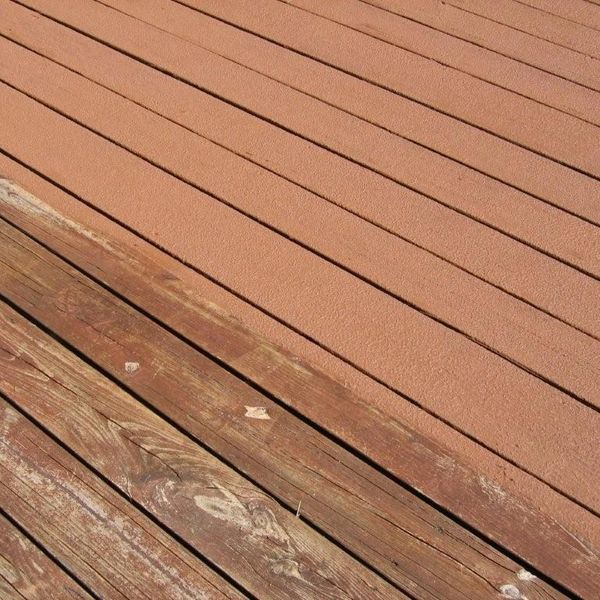 Before and after view of concrete pool deck coated with slip-resistant finish in New Smyrna Beach.