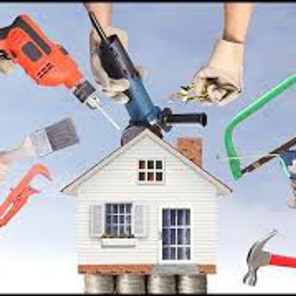 Versatile handyman service team replacing drywall and painting indoors in New Smyrna Beach.