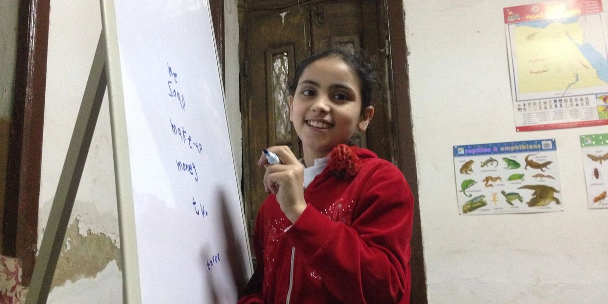 Girls hold the future, and Asmaa's smile assures us of a luminous tomorrow.