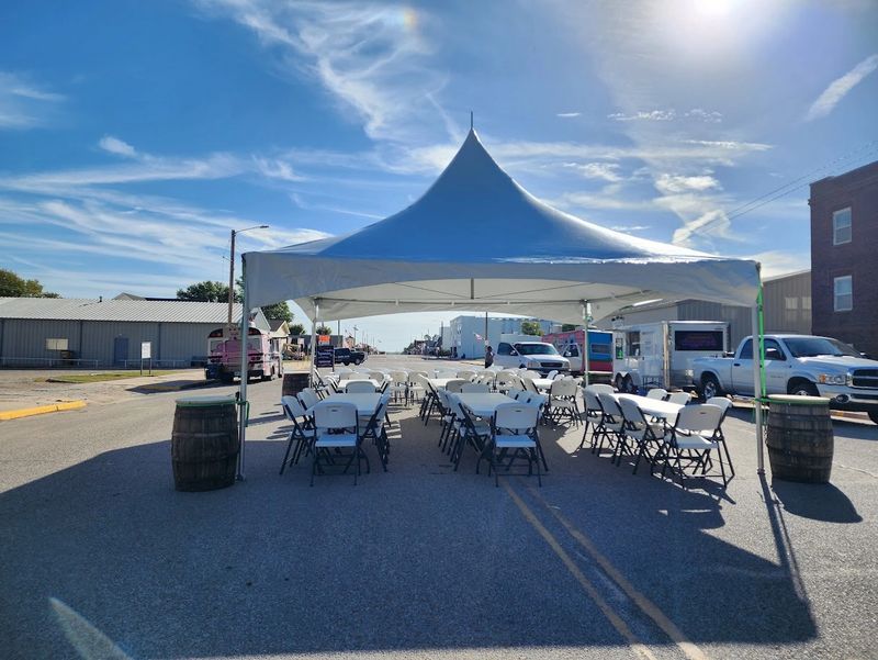 tent tables chairs whiskey barrels.jpg