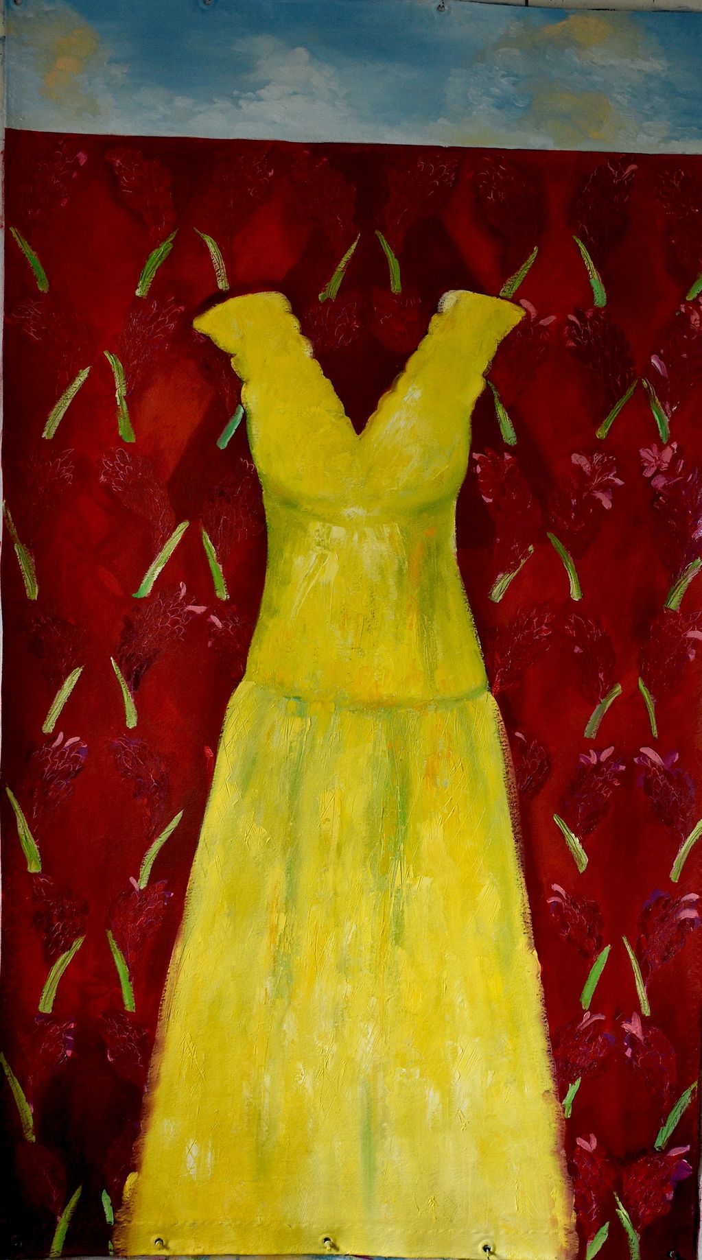 Yellow dress against floral background.