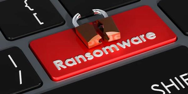 A red keyboard key labeled 'Ransomware' with an open padlock on top.