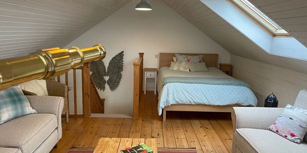 View of the bedroom with wooden flooring