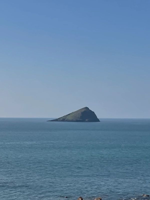 View of the rock in the middle of the sea