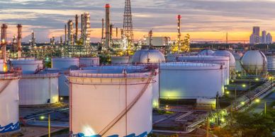 Petrochemical tanks with a background of the sky line.