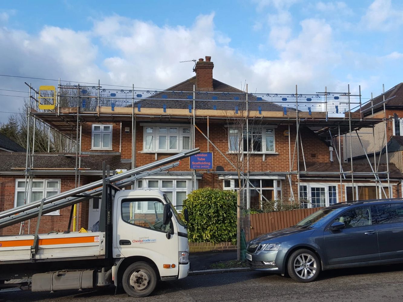 a house being refurbished on the exterior.