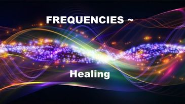 Colorful light waves with the text 'FREQUENCIES ~ Healing' on a dark background.