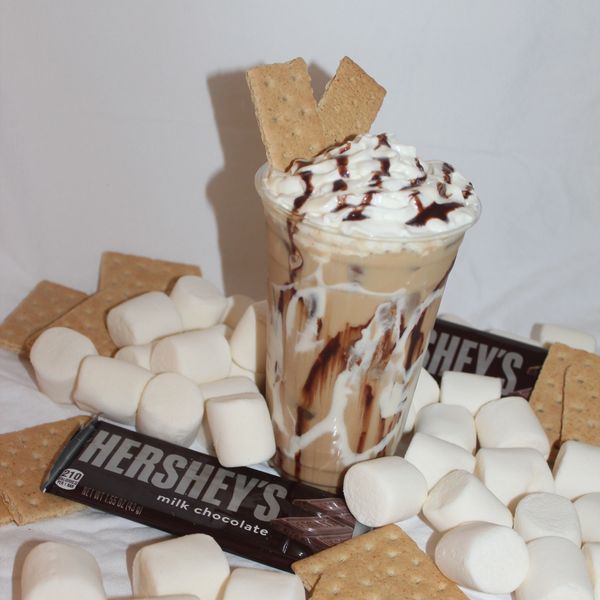 A s'mores-themed chocolate drink topped with whipped cream and graham crackers.