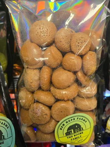 Bag of brown mushrooms labeled "New Hope Farms".
