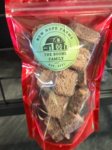 Packaged chocolate chunks from New Hope Farms by the Boone Family.