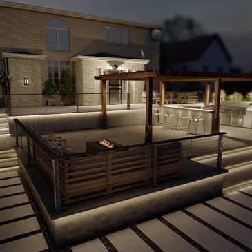 Hardscaped patio with deck and an outdoor kitchen.