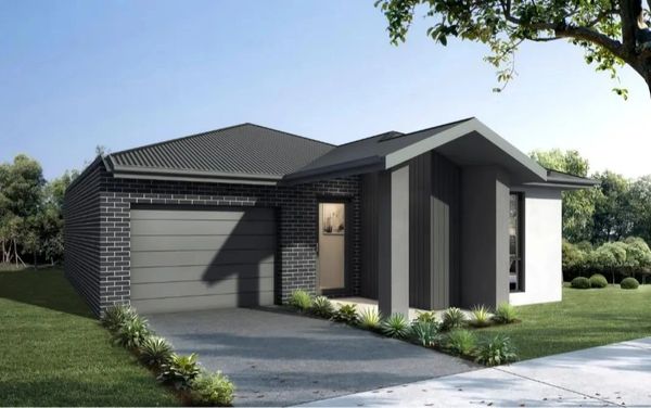 Modern single-story house with dark brick and gray accents.