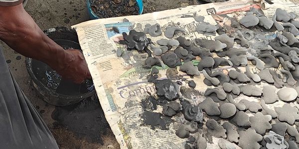 Wax models that have been dipped into a slurry and laid to dry.