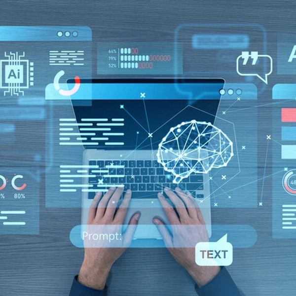 Hands typing on a laptop with AI and data visualization overlays.