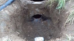 Prepped outlet of septic tank.