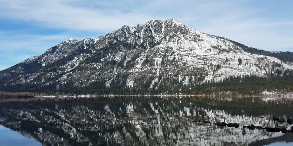 view of Dirty Face Peak from Glacier View Campground, reflected in Lake Wenatchee