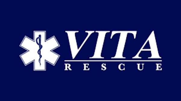 Logo of VITA Rescue with medical symbol on a dark blue background.