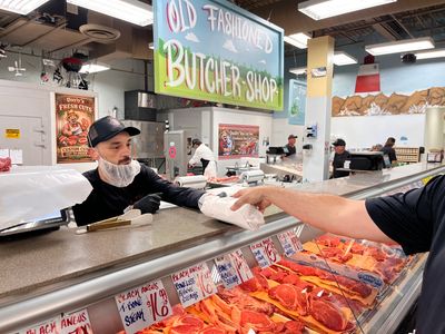Friendly butcher service with fresh cut meats at Dayly’s Farm Market.