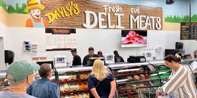 Old-fashioned deli and sub shop at Dayly’s Farm Market serving fresh-cut meats, cheeses, and made-to