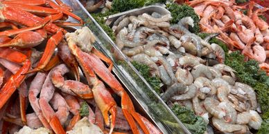 Fresh seafood display at Dayly’s Farm Market with shrimp, crab, and a variety of high-quality seafoo