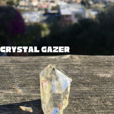 song: crystal gazer, single cover, crystal shining in the sun casting a rainbow