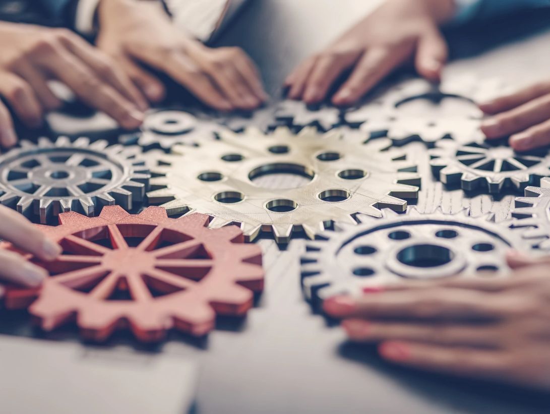 People coming together with their skills and expertise to the business table