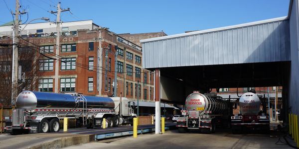 Distribution Trucks Tanker Trailers Hauling Liquid Sugar