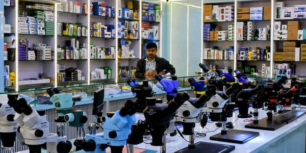 Mobile repair tools shop with microscopes and equipment
