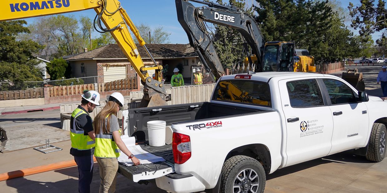 ESE engineers collaborate on project site to ensure the highest quality of construction management.
