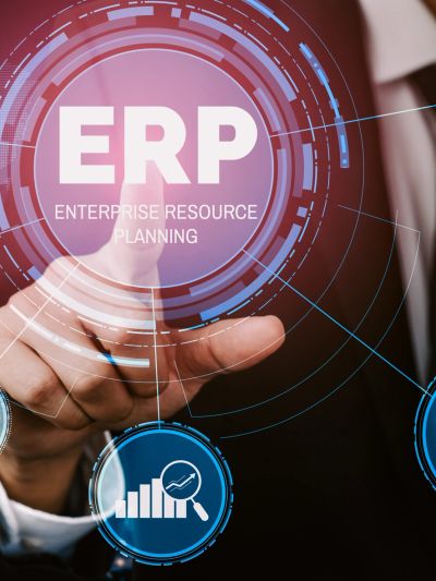 Businessman interacting with ERP digital interface.