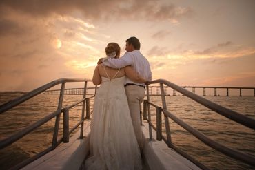 Sailboat ceremonies at South Padre Island beach weddings during a golden hour.