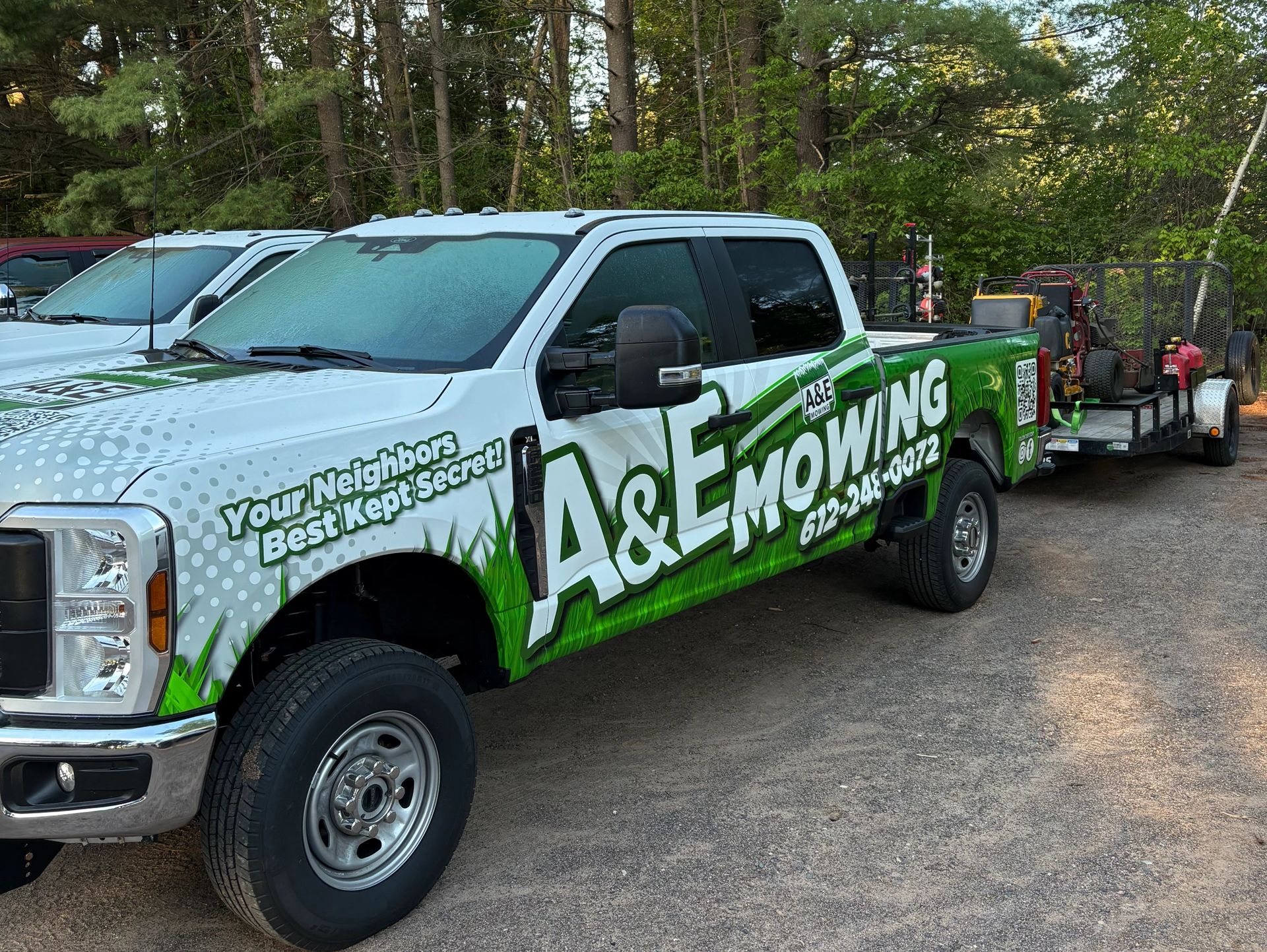 An A&E Mowing lawn care crew completing lawn mowing routes in Shoreview, Lino lakes, and nearby area
