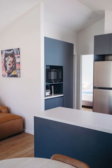Modern self-contained cabin kitchen and living area at Bridgewater Caravan Park