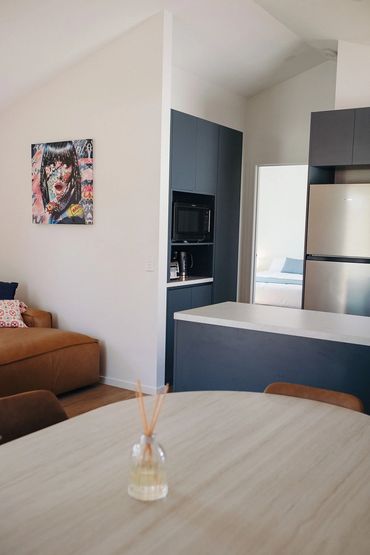 Modern self-contained cabin kitchen and living area at Bridgewater Caravan Park