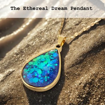 A glowing blue-green teardrop pendant.