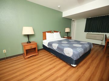 The room has one queen size beds and it is equipped with a fridge, microwave and a T.V.  including H
