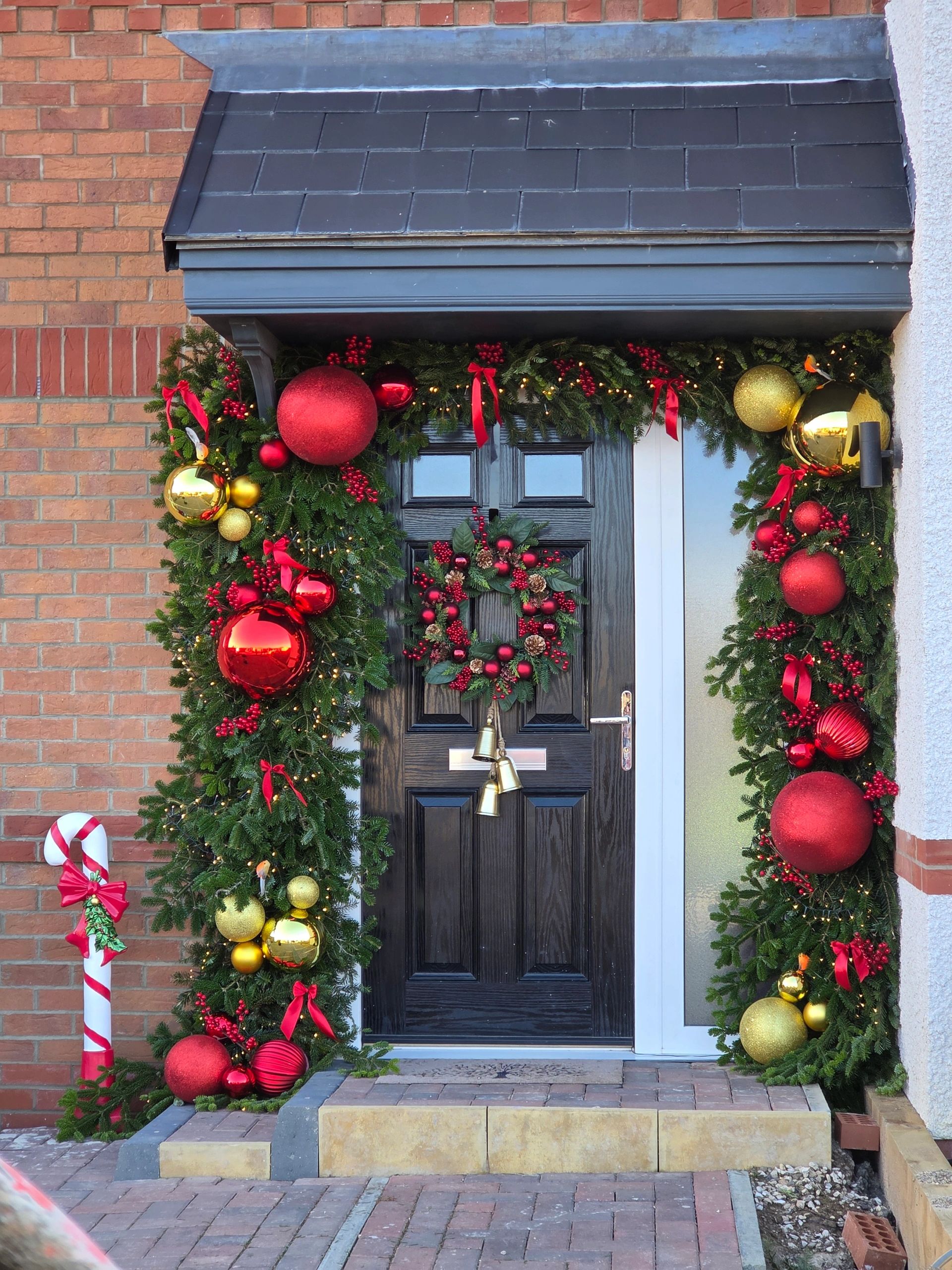 Luxury Christmas door garland styled around a festive front doorway