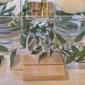 Elegant acrylic table numbers for wedding table decoration hire