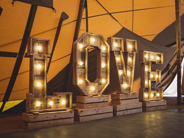 Rustic light up LOVE letters for wedding venue styling