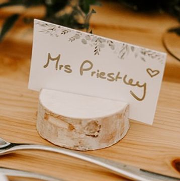 Mini wooden place card holders for rustic wedding table decoration hire