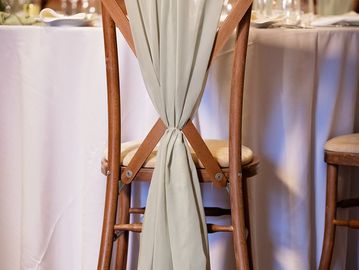 Sage green chiffon chair drapes, hire for weddings and events - Berkshire-Hampshire-Surrey.