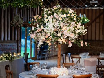 Mixed flower tabletop tree centrepiece for elegant wedding table styling in Berkshire
