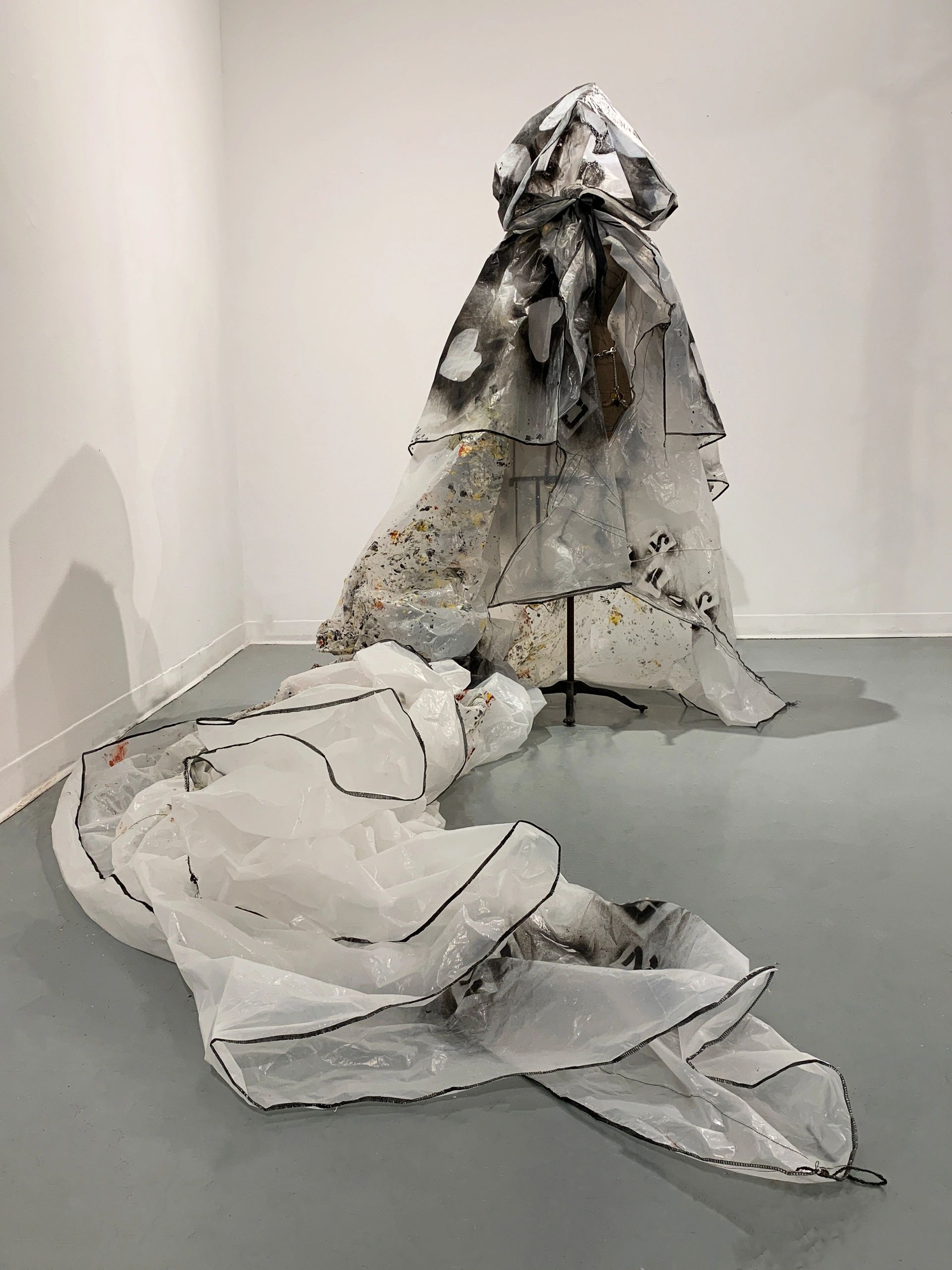 Abstract translucent black and white fabric sculpture.